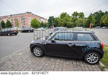 Germany - August 2015: Car Sharing Car In The Parking Lot In The City. Close-up Of A Company Sign On