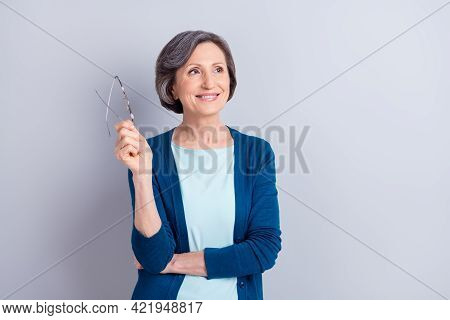 Portrait Of Attractive Dreamy Cheerful Gray Haired Woman Fantasizing Copy Space Isolated Over Grey P