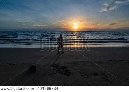 Silhouette People With Beautiful Idyllic Seascape Sunset View On Kohkood Island In Low Season Travel