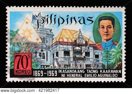ZAGREB, CROATIA - SEPTEMBER 18, 2014: Stamp printed in Philippines from the Birth Centenary of President Emilio Aguinaldo issue shows President Aguinaldo and Cavite Building, circa 1969.