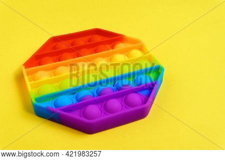 Toy Pop It. Poppit Is A New Fidget Toy, Popular Among Children And People With Special Needs. On A Y