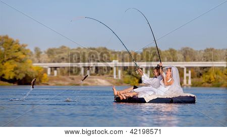 The Bride And Groom Are Fishing