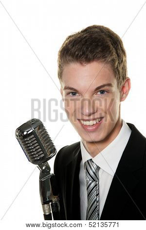 a young singer with retro microphone singing karaoke