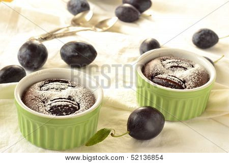 Clafoutis with plums and chocolate