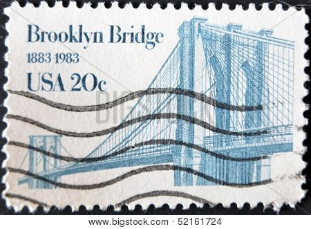 a stamp printed in USA shows Brooklyn Bridge centenary of Brooklyn Bridge