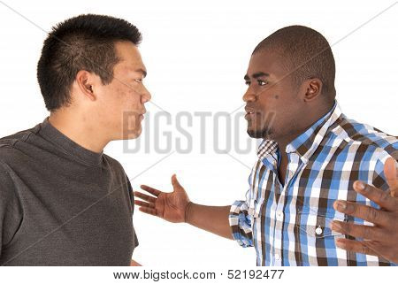 Ethnic Brothers Having An Arguement With Angry Looks At Each Other