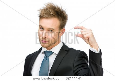 Portrait of manager showing small amount of something, isolated on white