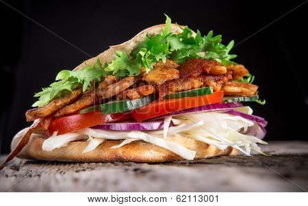 Doner Kebab - grilled meat, bread and vegetables