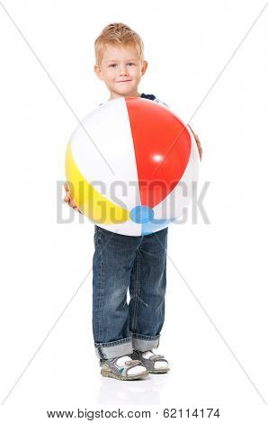 Little boy with colorful ball, isolated on white background