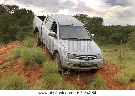 Silver Toyota Triton Dhd Crossing Obstacle