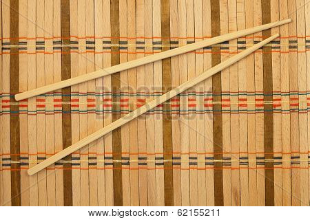 Chopsticks on a wicker mat