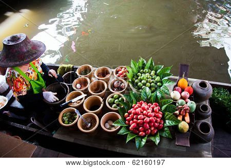 Fresh ingredients in a boat at Taling Chan floating market, Thailand