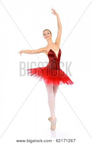 Professional bellet dancer posing at studio. Isolated over white background. 
