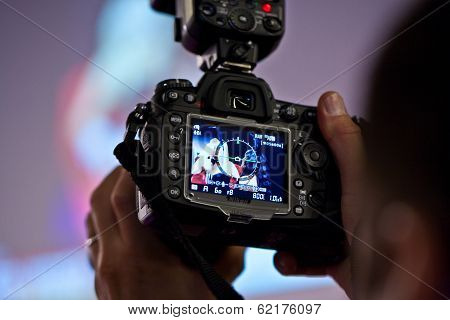 Playboy Shooting With Models For Visitors At Photokina Exhibition
