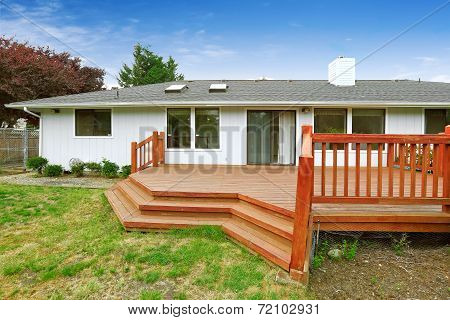 Spacious Walkout Deck With Railings And Stairs