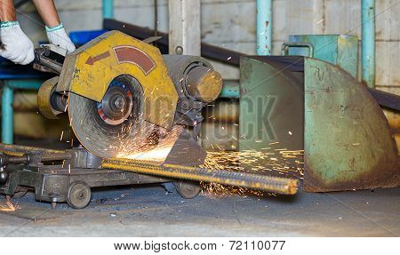Worker Cutting Steel By Cutting Wheel