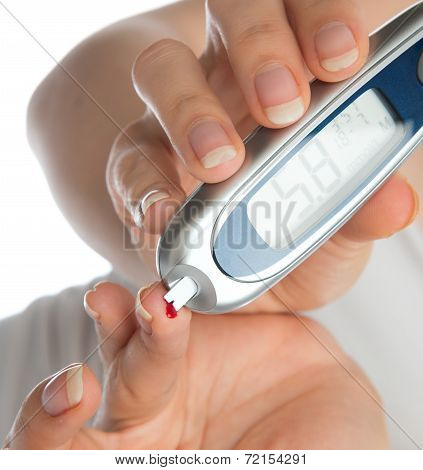 Diabetic Patient Measuring Glucose Level Blood Test