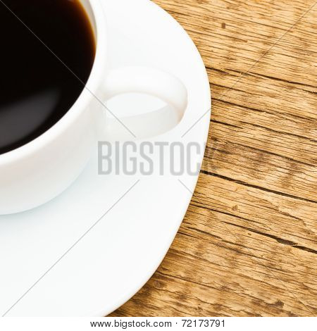 Close Up Of White Ceramic Coffee Cup On Wooden Table - Studio Shoot