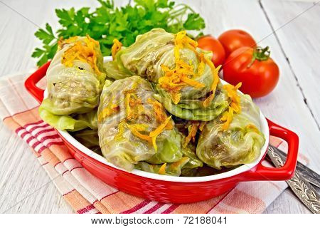 Cabbage Stuffed And Carrots In Pan On Napkin