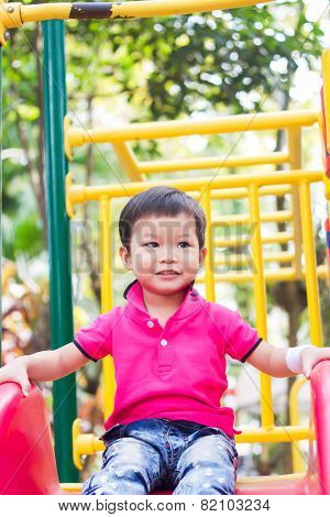 Asian Boy Relax In The Park