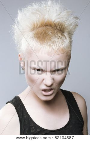 angry aggressive girl in black lenses.