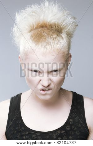 angry aggressive girl in black lenses.