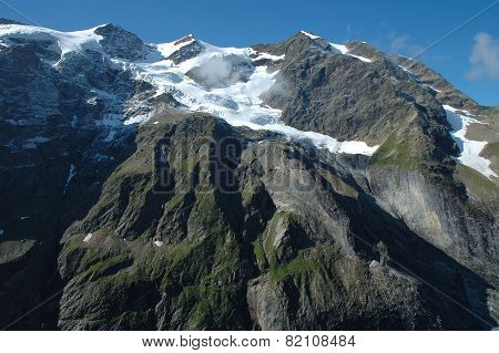 Peaks In Snow And Glacier Nearby Grindelwald In Switzerland