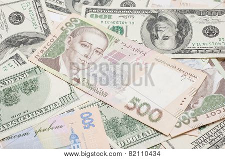The Many Dollars And Ukrainian Money. Money Background