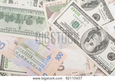 The Many Dollars And Ukrainian Money. Money Background