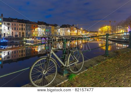 Embankment of the river Leie in Ghent town at night, Belgium