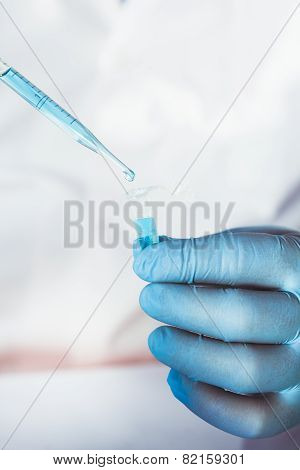 Scientist in chemical lab