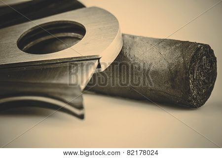 Cigar And Cutter On A White Background
