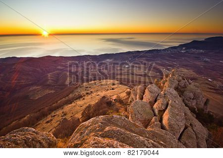 aerial view from mountains of magnificent sunrise above the sea