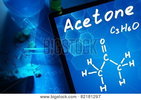 Tablet with the chemical formula of Acetone.