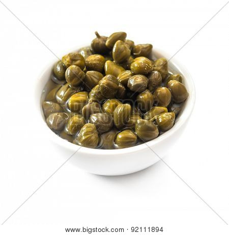 bowl of capers isolated on a white background