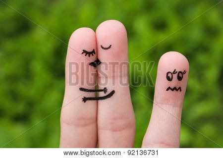 Finger art of a Happy couple. The happy couple kissing and hugging.