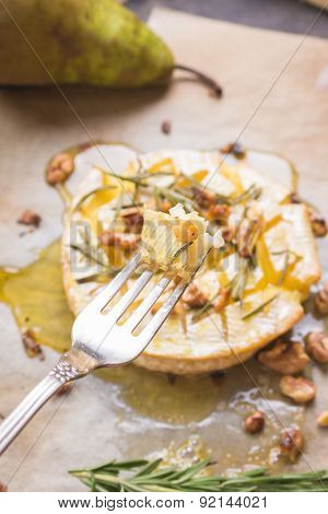 Delicious Baked Camembert With Honey, Walnuts, Herbs And Pears