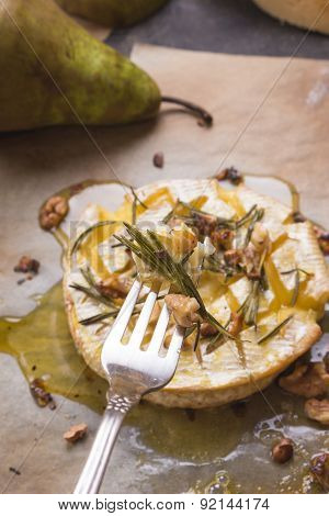 Delicious Baked Camembert With Honey, Walnuts, Herbs And Pears