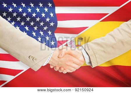 Businessmen Handshake - United States And Spain
