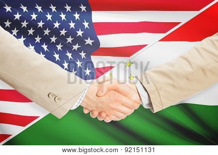 Businessmen Handshake - United States And Tajikistan