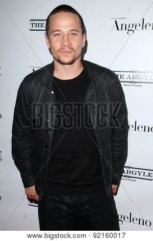 LOS ANGELES - MAY 31:  Travis Aaron Wade at the Angeleno Magazine  June 2015 Issue Party with Cover Man Adrian Grenier at the The Argyle on May 31, 2015 in Los Angeles, CA