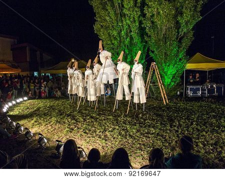 People On Stilts Perform Romeo And Juliet  Wearing Carnival Costumes