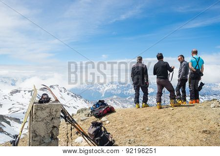 Alpinists On Top At High Altitude In The Alps