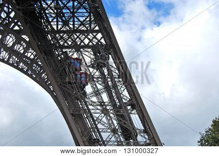 Detail of the incredible structure of the Eiffel Tower in Paris - France