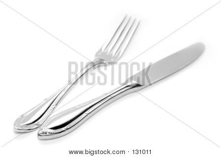 Cuchillo y tenedor de plata