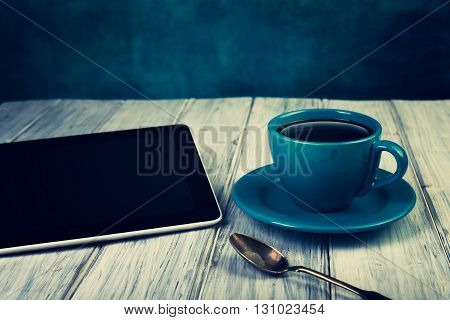 Coffee And Tablet On The Table