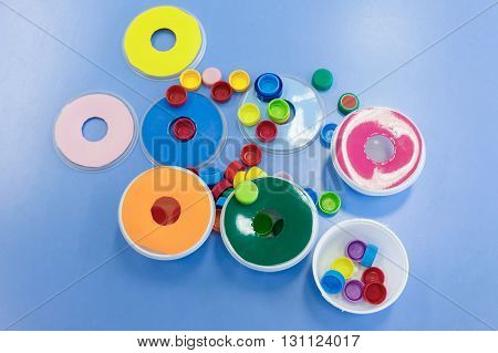 Homemade do-it-yourself educational toys arranging and sorting colors. Learning through experience concept intelligence development educational approach concept.