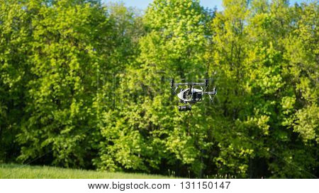 Flying Drone Is Filming In The Forest Background