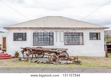 A historic ox-wagon on display next to the main street in Wolwefontein a small village between Kirkwood and Jansenville in the Eastern Cape Province