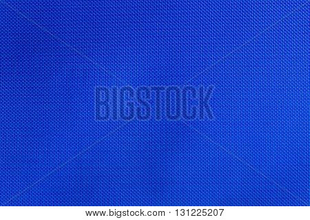 Blue nylon fabric texture background, copy space